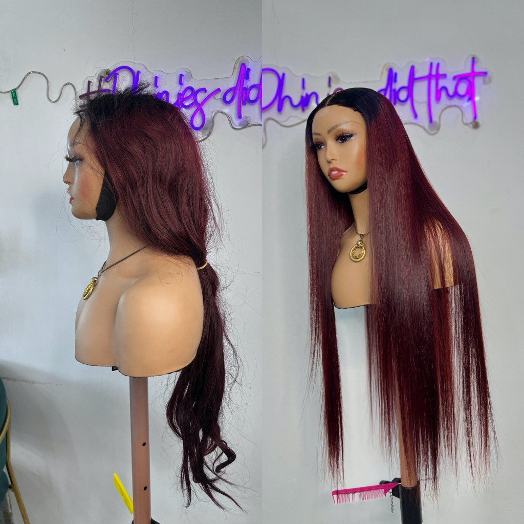 Burgundy wig styled on a mannequin head